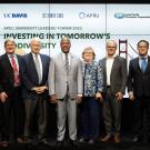 Six Association of Pacific Rim Universities representatives smile in a group photo